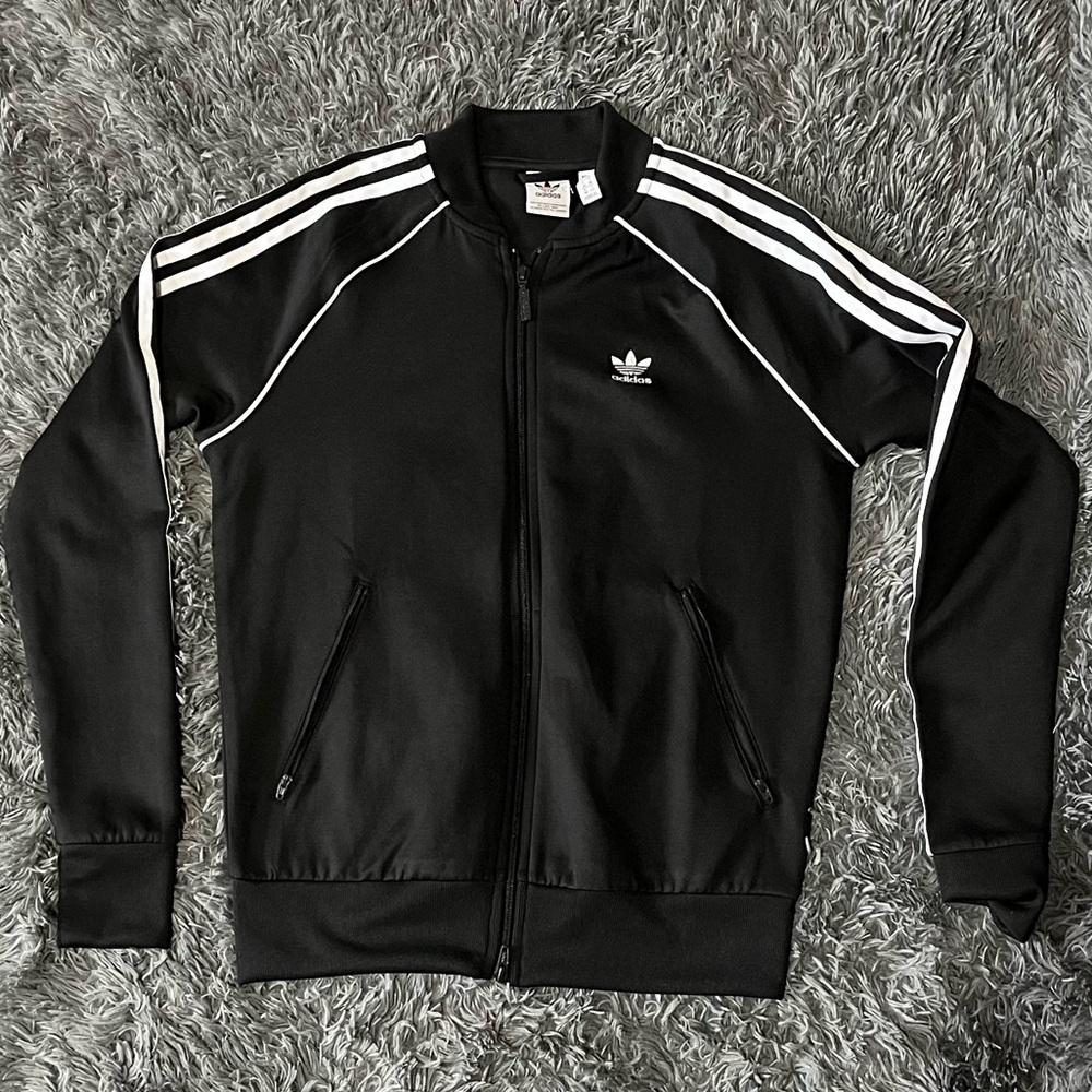 Adidas women’s small track jacket In Black